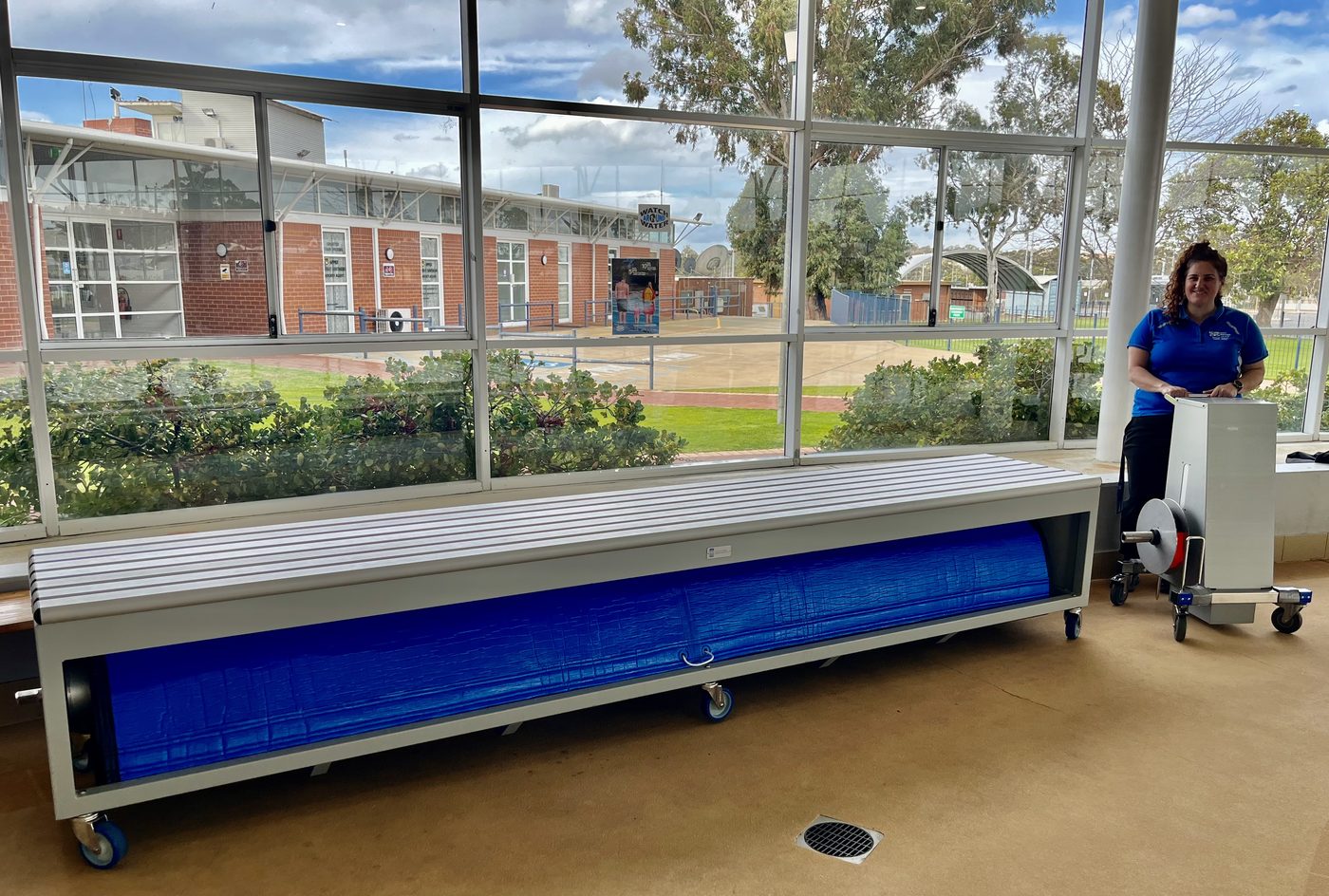 Blanket Buddy motorised roller drive in use at a commercial pool